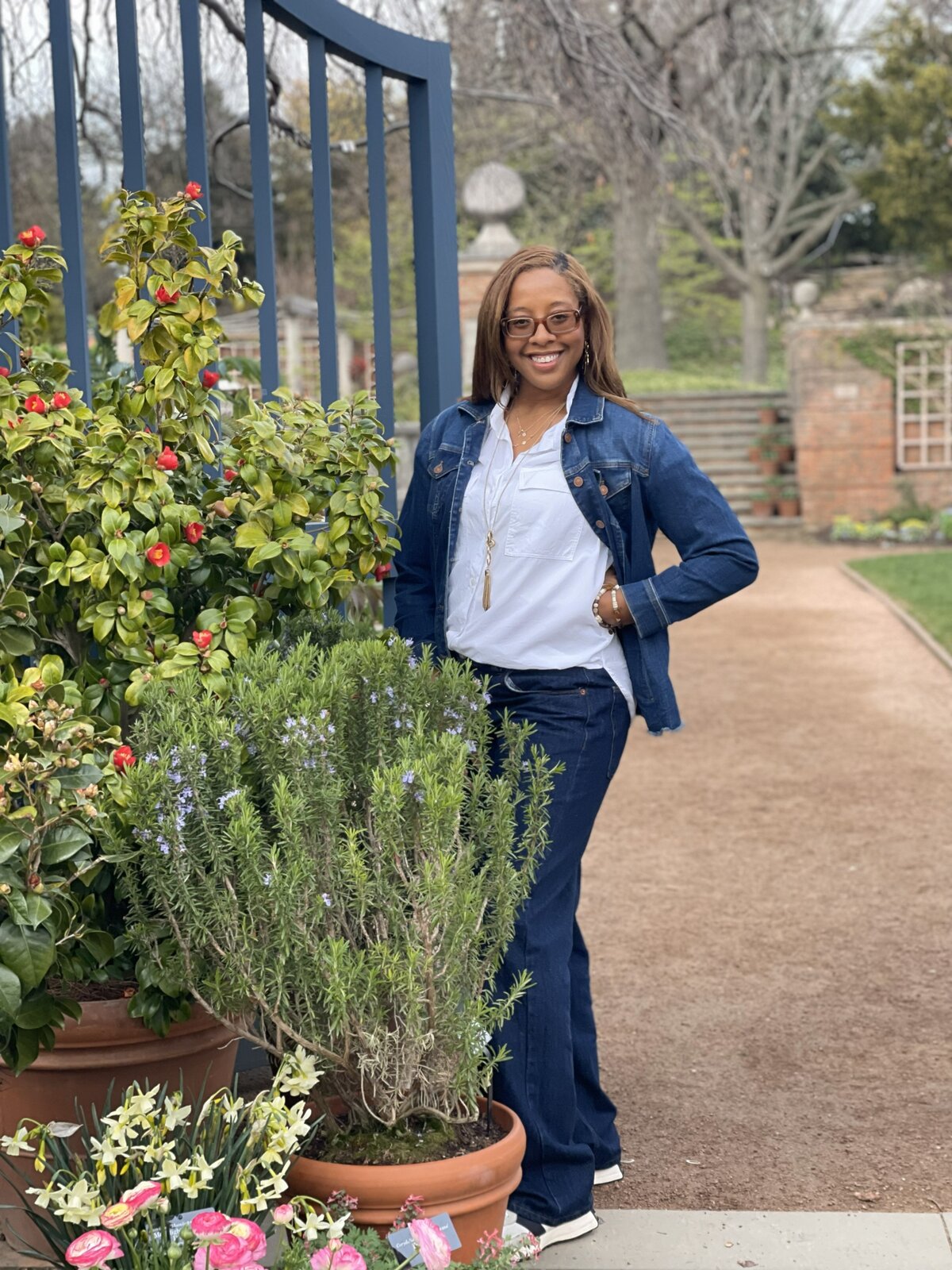 Kendra at the garden gate, your Soil Sister